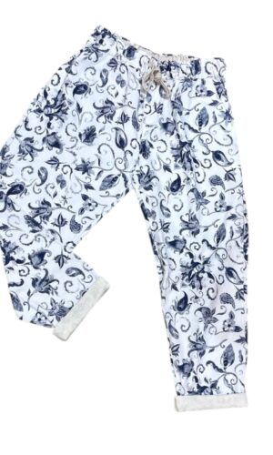 Pantalone in cotone a fiori con risvolto in pizzo san gallo
